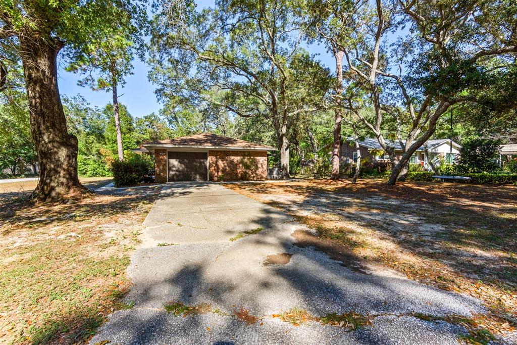 1040 Jocelin Road Pensacola, FL 32506 - Photo 4 of 46 a view of house with trees in the background