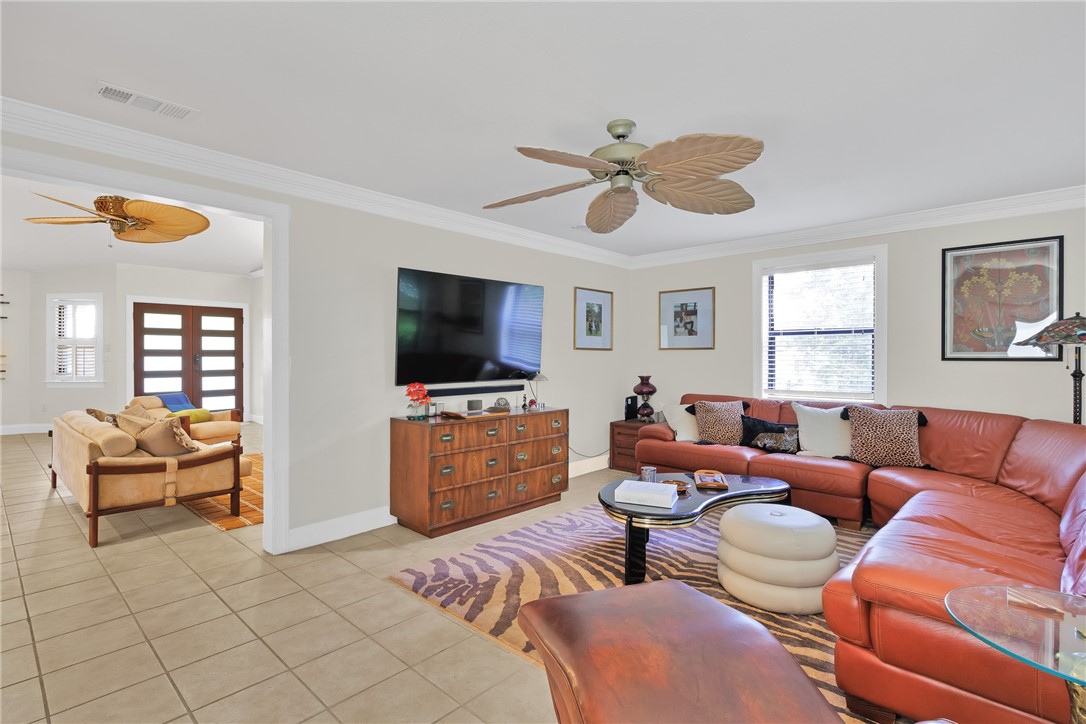 380 Bayfront Terrace Sebastian, FL 32958 - Photo 11 of 32 a living room with furniture and a flat screen tv