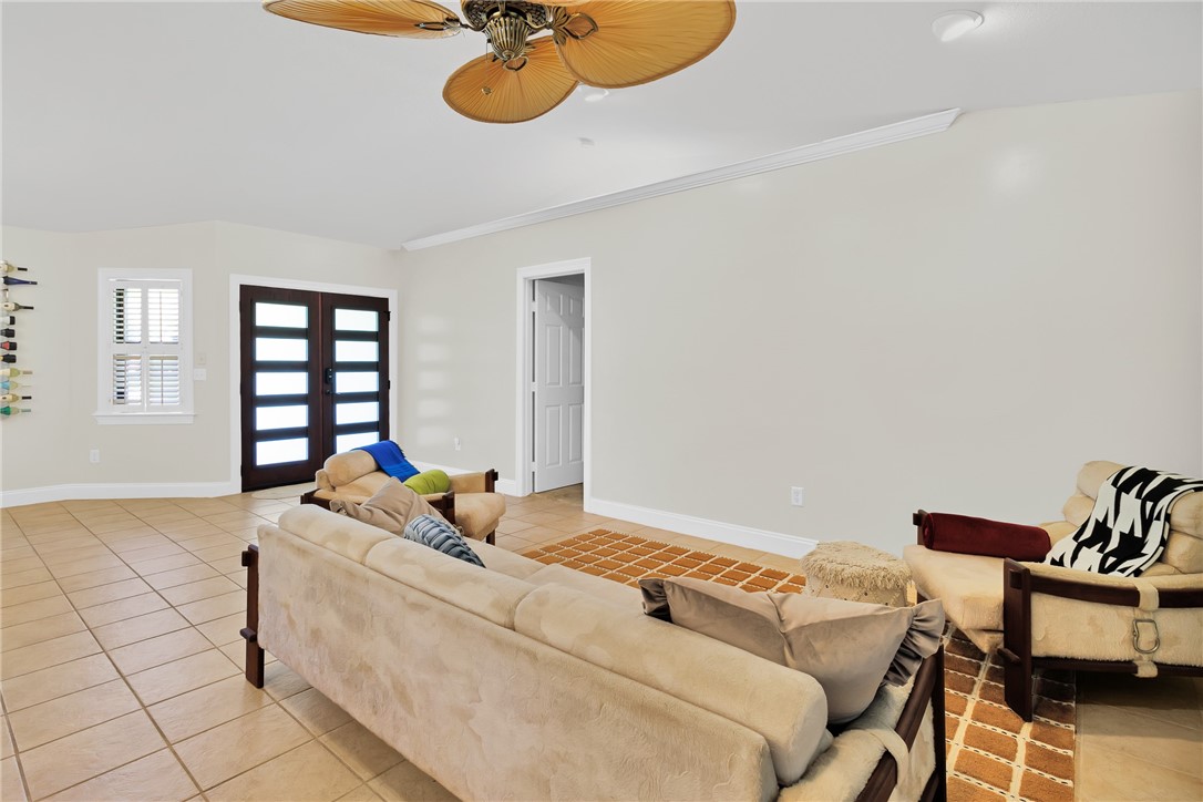 380 Bayfront Terrace Sebastian, FL 32958 - Photo 15 of 32 a living room with a bed furniture and a window