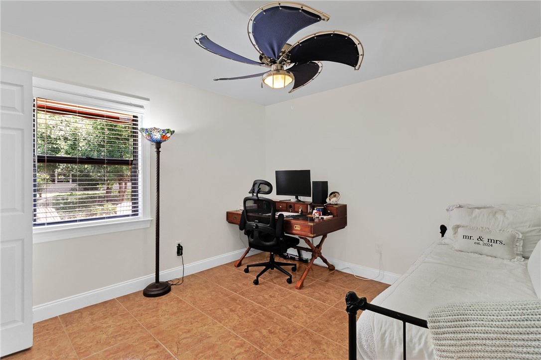 380 Bayfront Terrace Sebastian, FL 32958 - Photo 27 of 32 a view of a workspace with furniture and a window