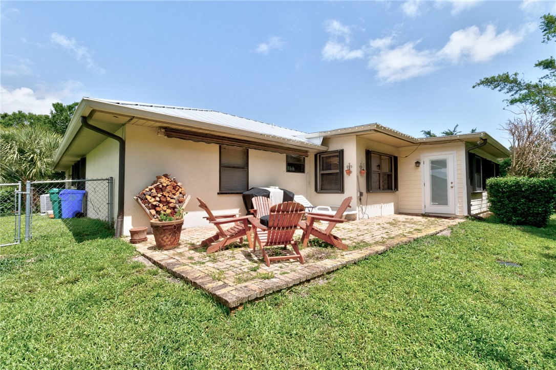 380 Bayfront Terrace Sebastian, FL 32958 - Photo 9 of 32 a front view of a house with patio