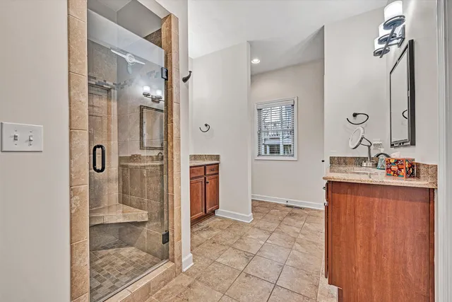 a view of an empty room with a staircase