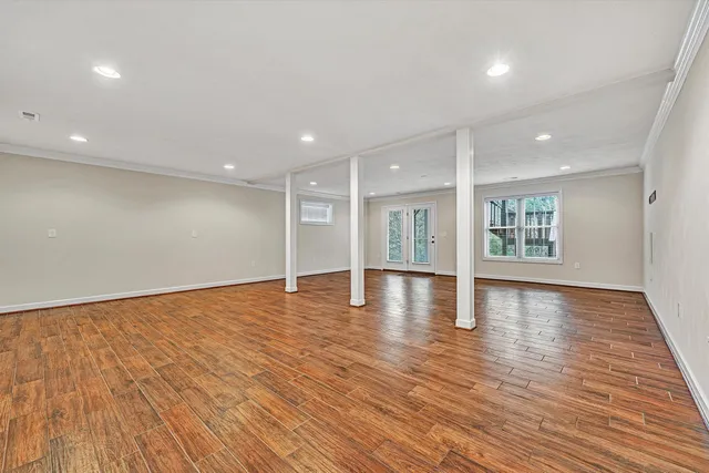 a view of a bathroom with shower and a bathtub