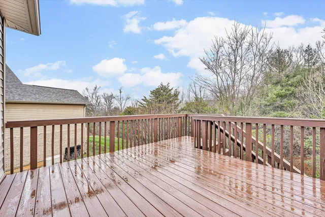 a front view of a building with outdoor seating