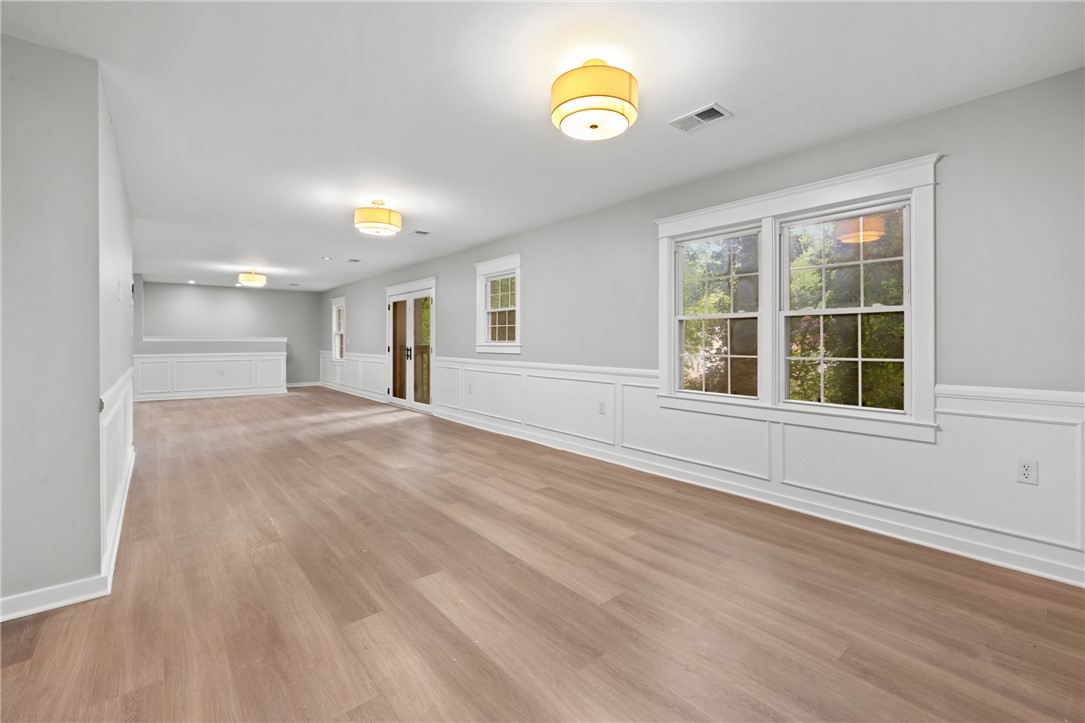 309 Woodland Way Clemson, SC 29631 - Photo 14 of 43 This spacious interior features bright windows and durable flooring, ideal for versatile living arrangements.