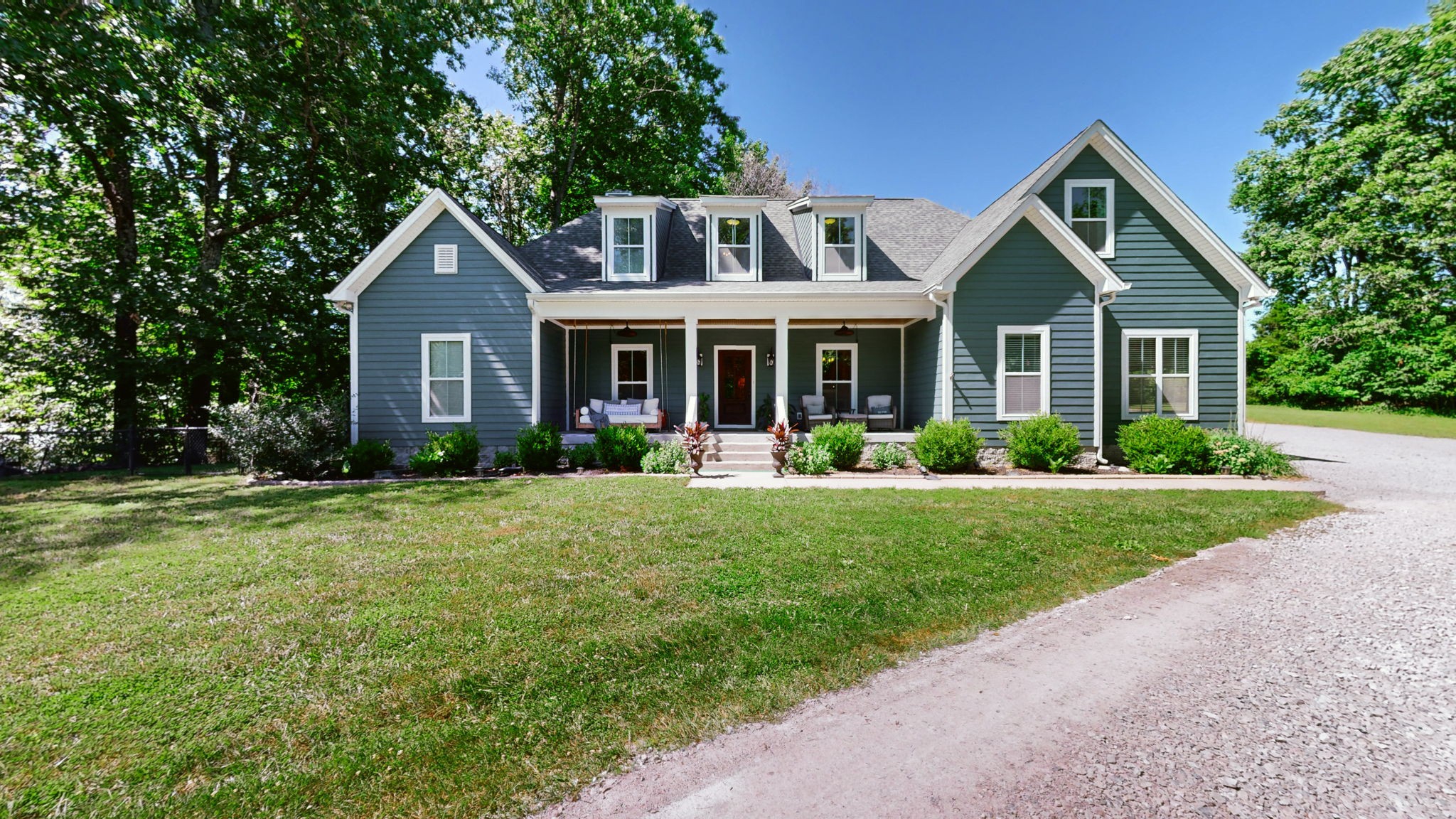 4852 Ash Hill Road Spring Hill, TN 37174 - Photo 2 of 60 a front view of house with yard and green space