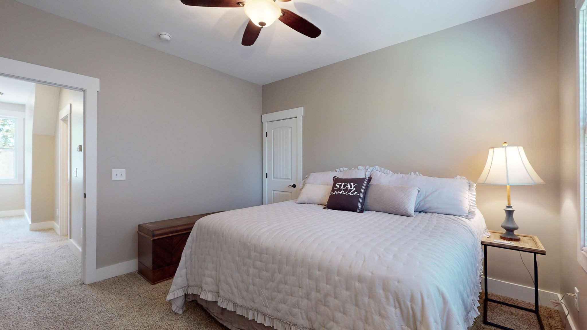 4852 Ash Hill Road Spring Hill, TN 37174 - Photo 30 of 60 a bedroom with a bed and a lamp
