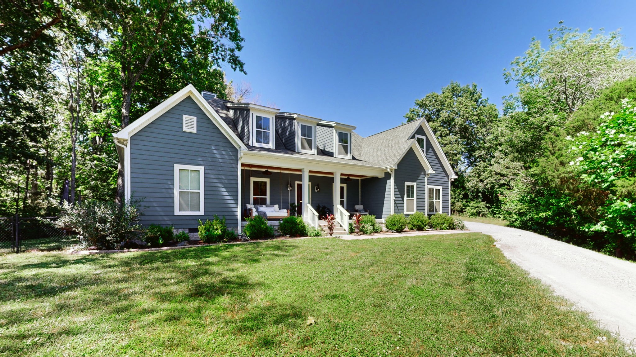 4852 Ash Hill Road Spring Hill, TN 37174 - Photo 3 of 60 a front view of a house with a yard