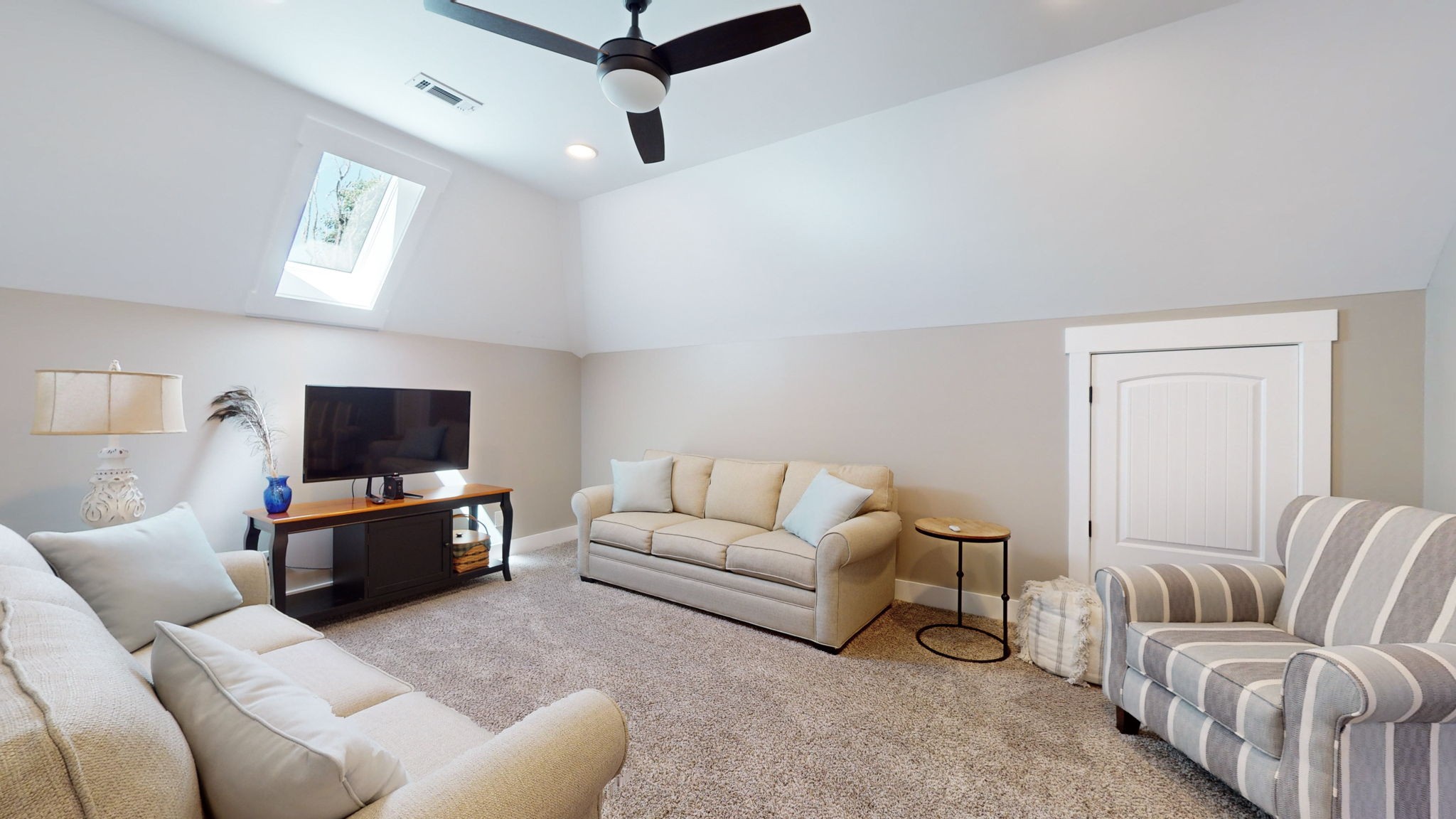 4852 Ash Hill Road Spring Hill, TN 37174 - Photo 33 of 60 a living room with furniture and a flat screen tv