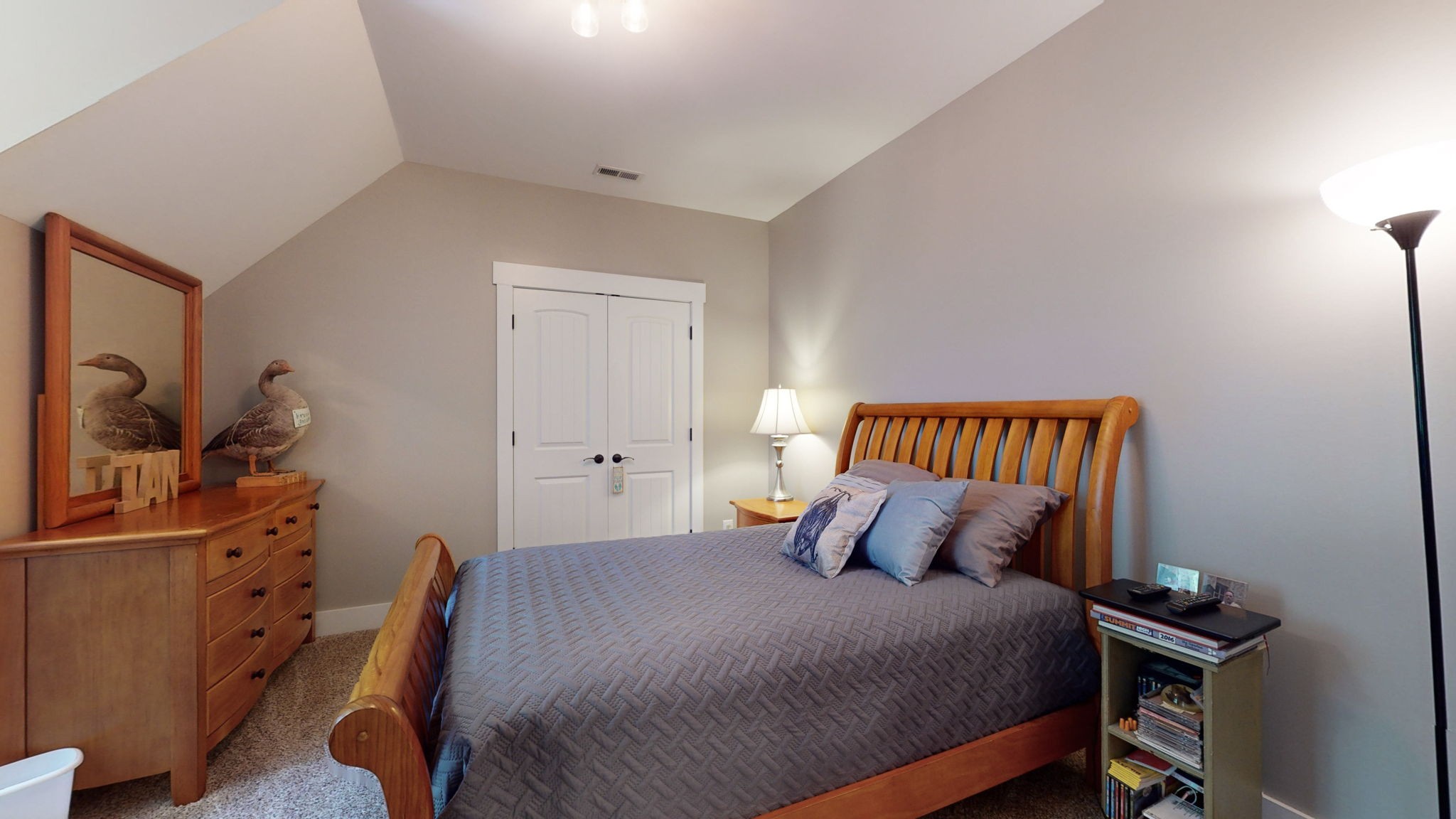 4852 Ash Hill Road Spring Hill, TN 37174 - Photo 36 of 60 a bedroom with a bed and wooden floor