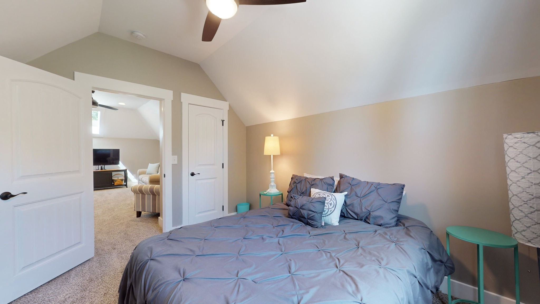 4852 Ash Hill Road Spring Hill, TN 37174 - Photo 38 of 60 a bedroom with a bed and a large mirror