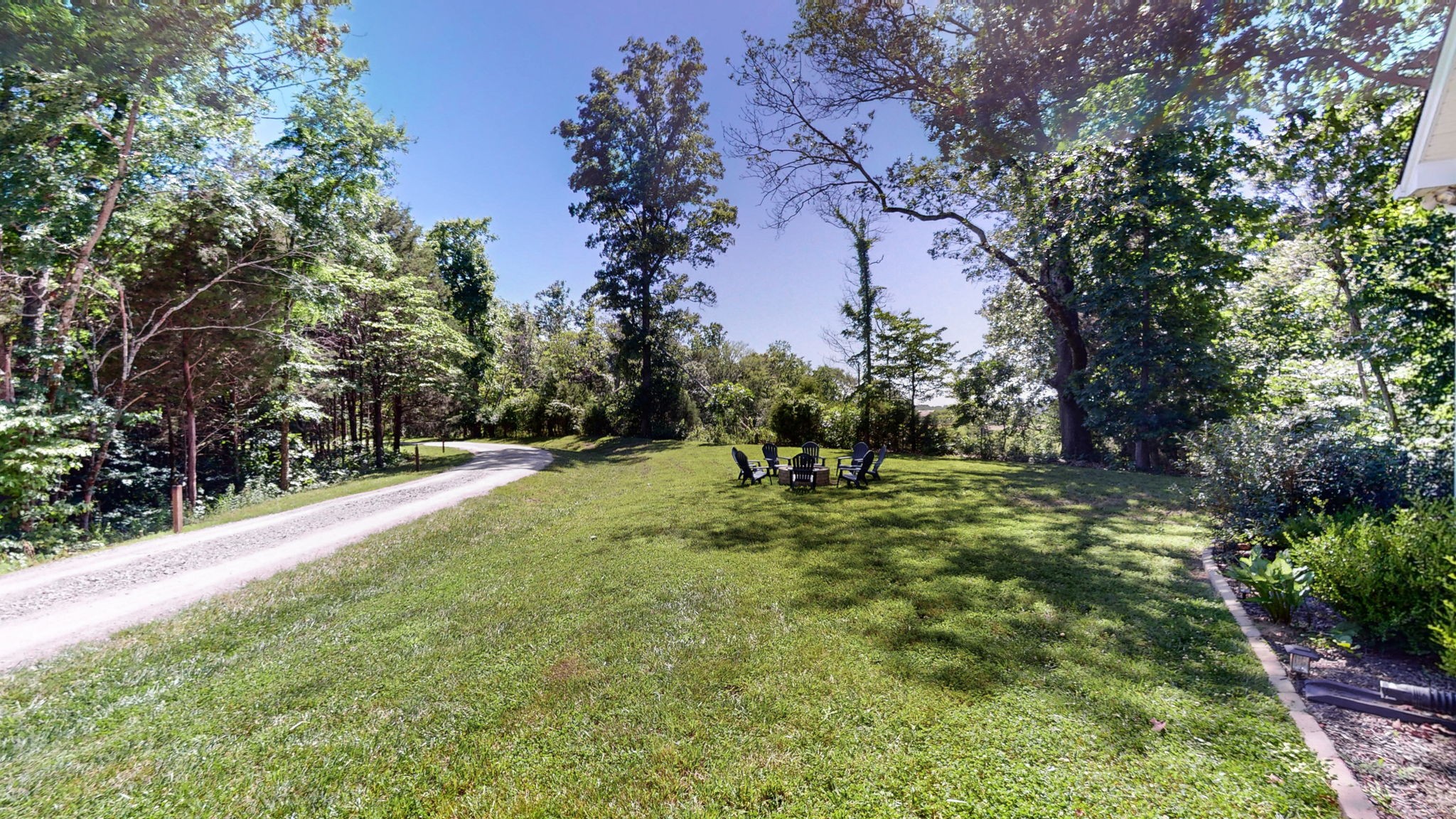 4852 Ash Hill Road Spring Hill, TN 37174 - Photo 46 of 60 a yard with trees in the background
