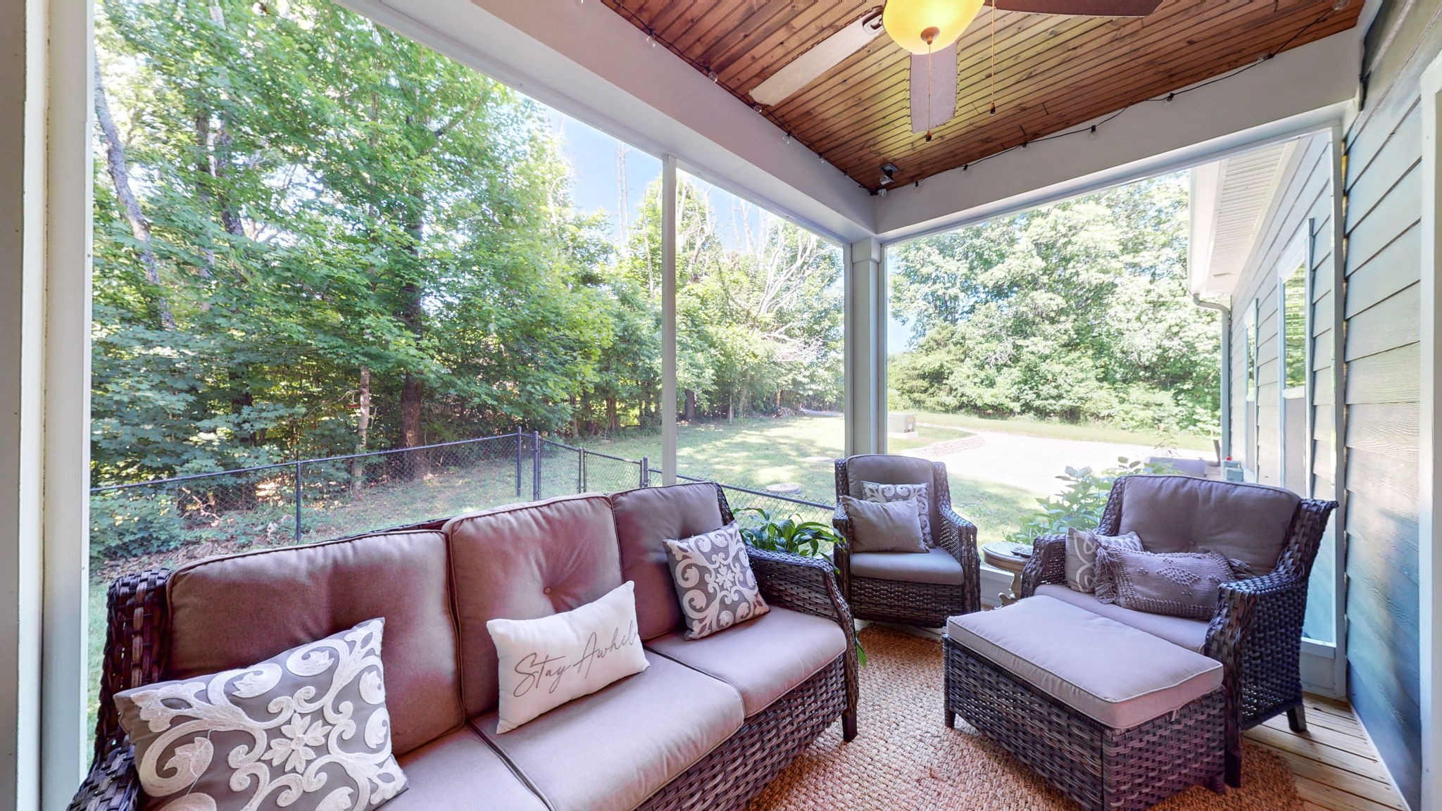 4852 Ash Hill Road Spring Hill, TN 37174 - Photo 50 of 60 a balcony with furniture and a large window