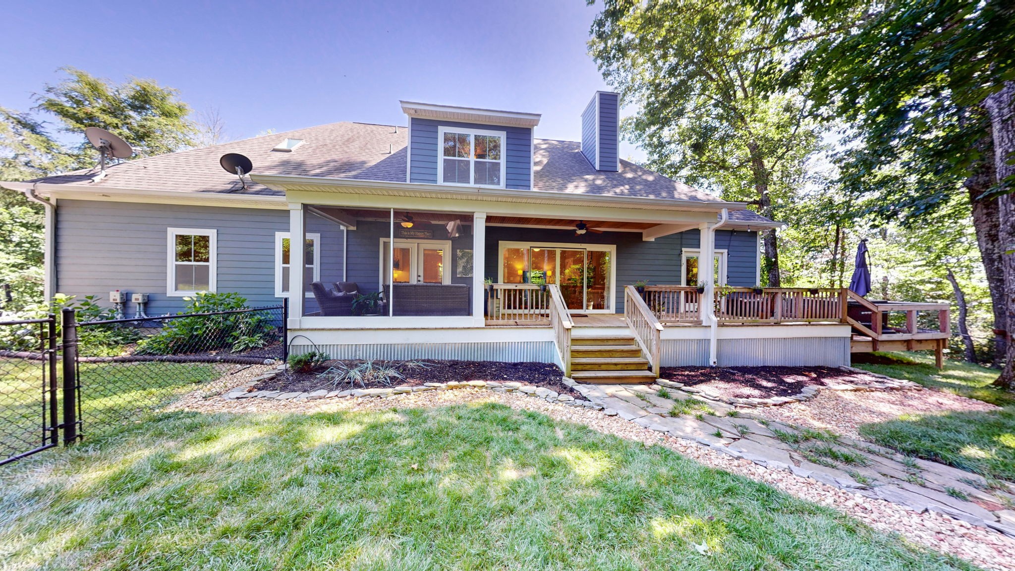 4852 Ash Hill Road Spring Hill, TN 37174 - Photo 7 of 60 a front view of a house with a garden and patio