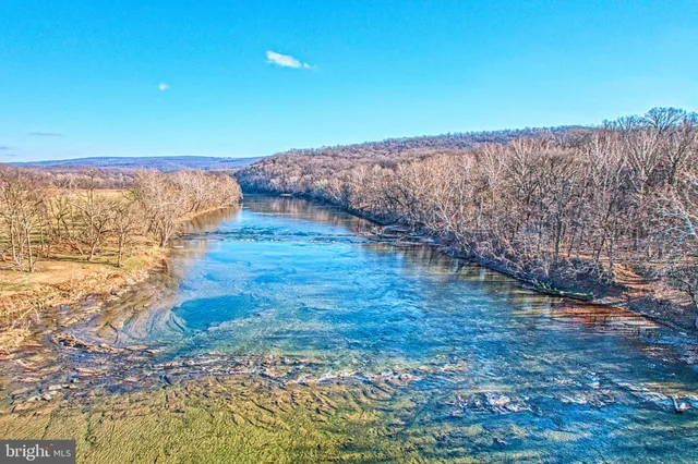 a view of a house with snow on the wall