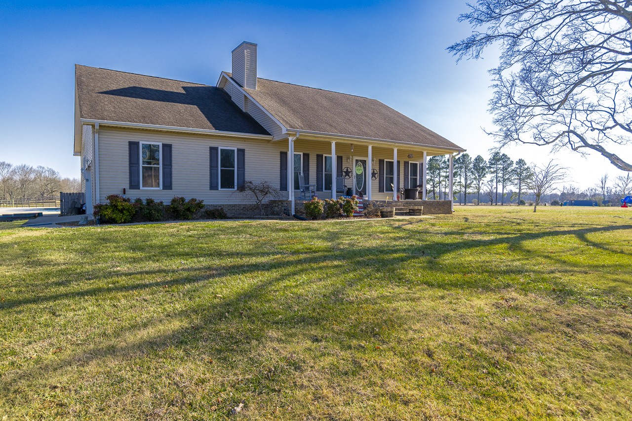 182 Old Camargo Road Fayetteville, TN 37334 - Photo 1 of 59 a front view of a house with a yard