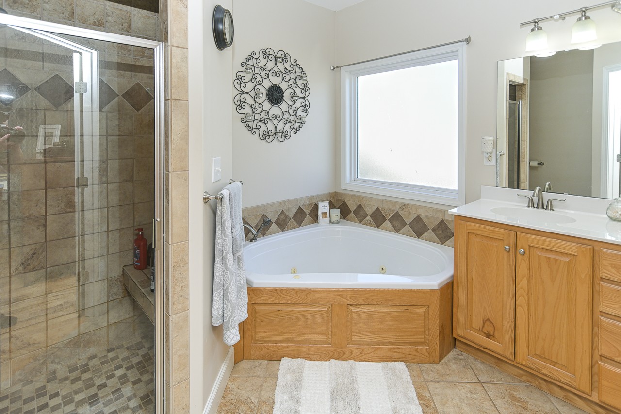 182 Old Camargo Road Fayetteville, TN 37334 - Photo 15 of 59 a bathroom with a bathtub and shower