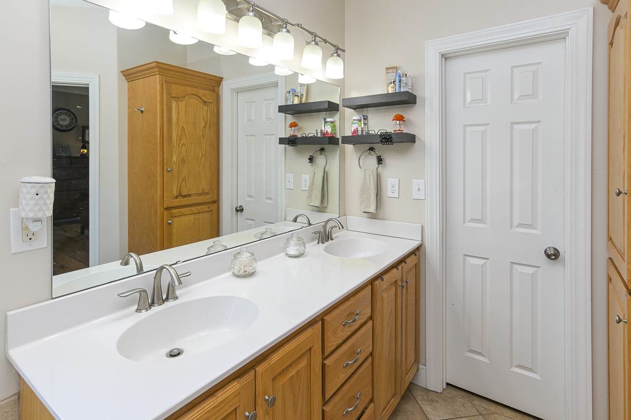 182 Old Camargo Road Fayetteville, TN 37334 - Photo 16 of 59 a bathroom with a sink and a mirror