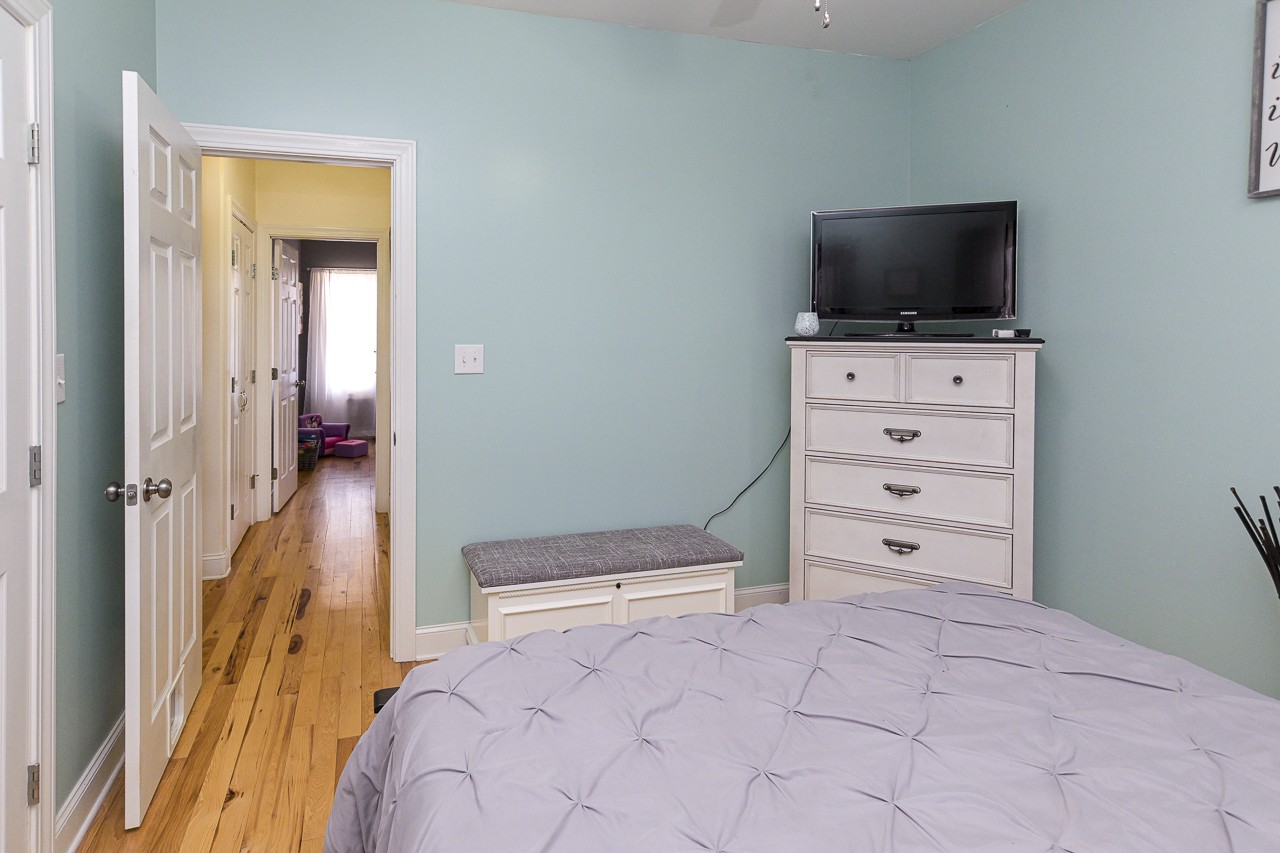 182 Old Camargo Road Fayetteville, TN 37334 - Photo 20 of 59 a bedroom with a bed and a flat screen tv