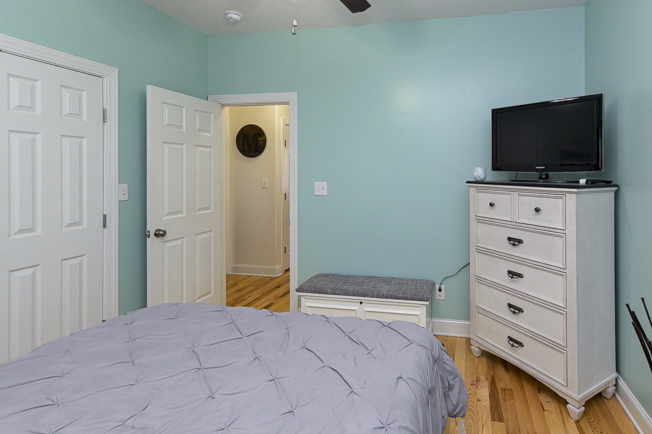 182 Old Camargo Road Fayetteville, TN 37334 - Photo 21 of 59 a bedroom with a bed and flat screen tv