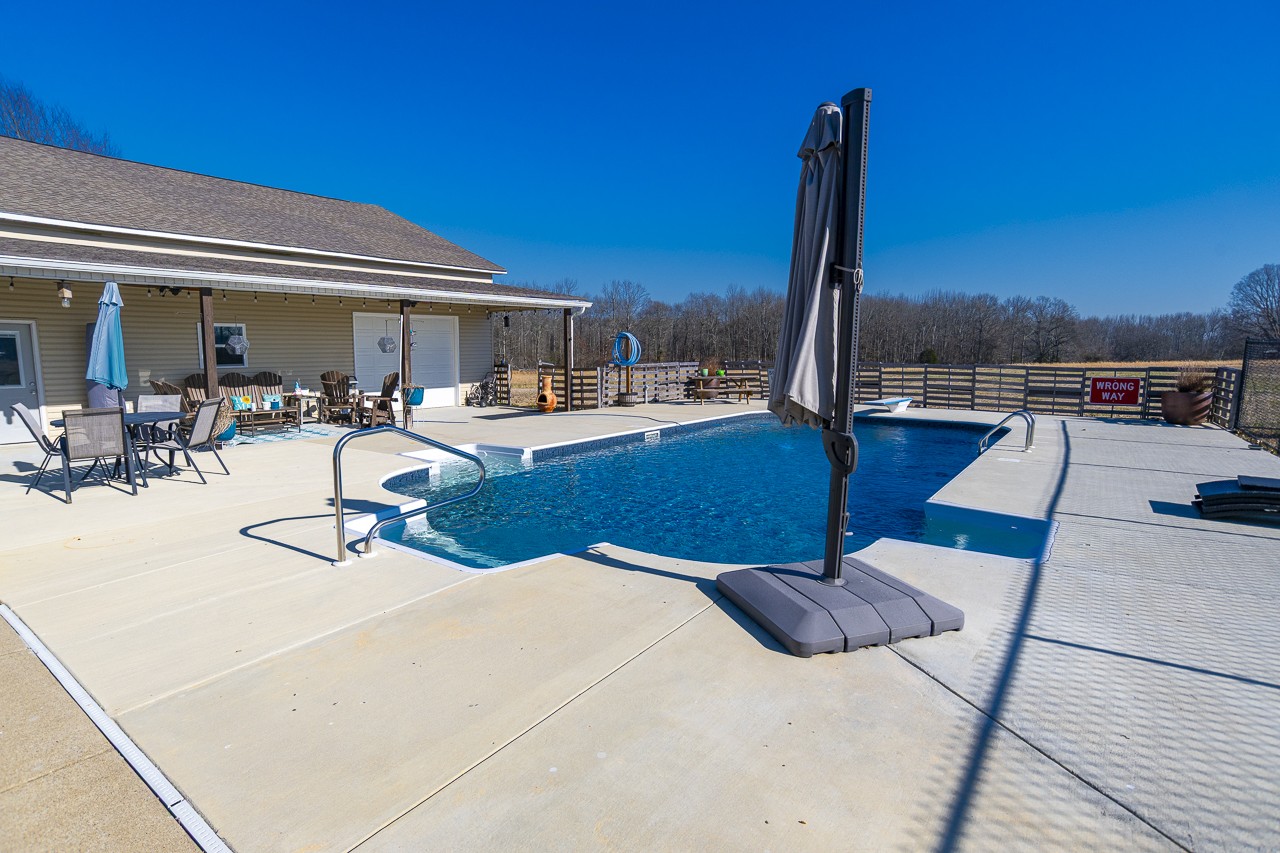 182 Old Camargo Road Fayetteville, TN 37334 - Photo 27 of 59 a view of a patio with chairs and tables