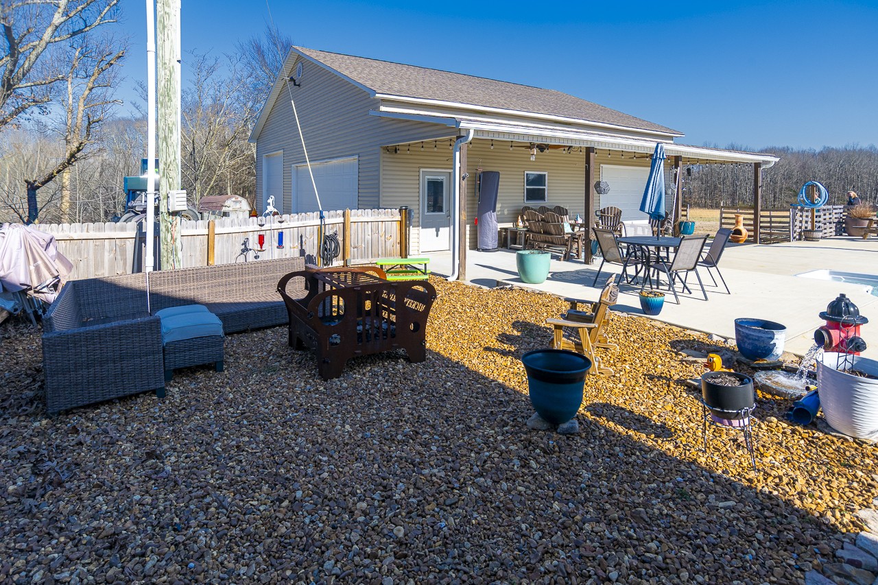 182 Old Camargo Road Fayetteville, TN 37334 - Photo 32 of 59 a building outdoor space with patio furniture and potted plants