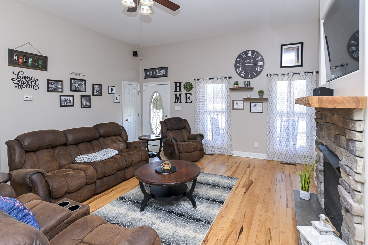182 Old Camargo Road Fayetteville, TN 37334 - Photo 4 of 59 a living room with furniture and a fireplace