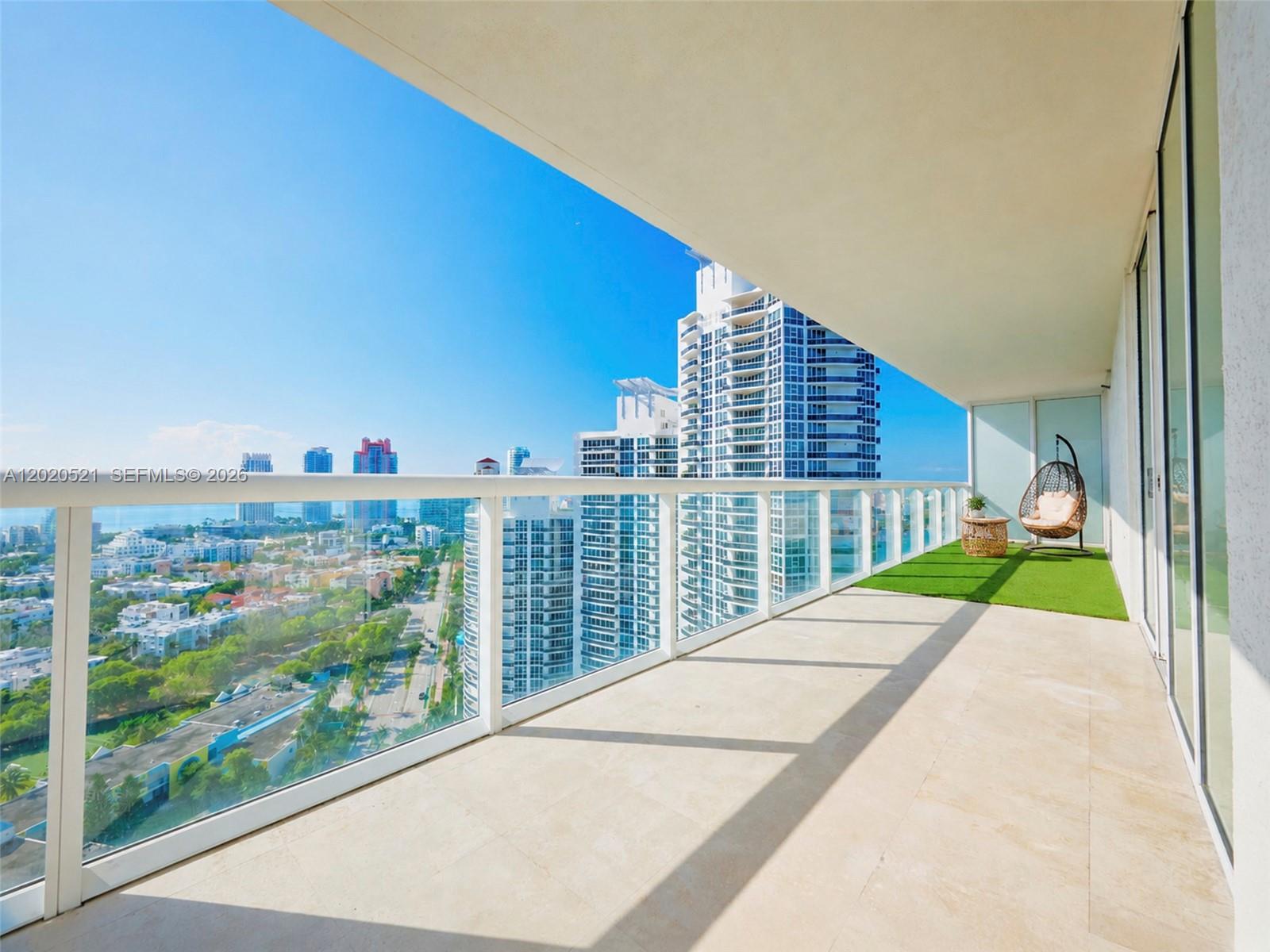 450 Alton Road, Unit 2810 Miami Beach, FL 33139 - Photo 19 of 29 a view of a balcony with city view