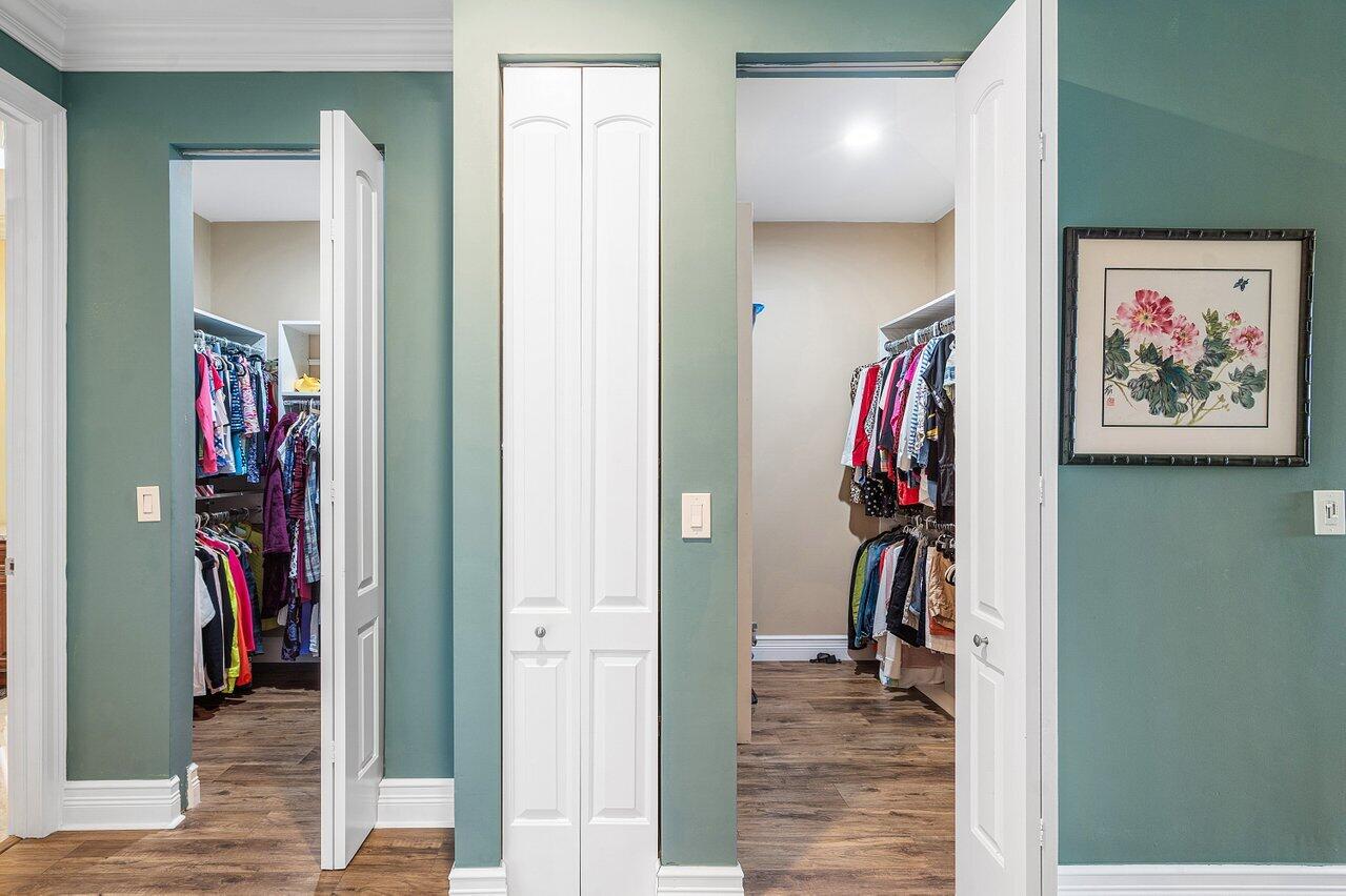 6052 Terra Mere Circle Boynton Beach, FL 33437 - Photo 24 of 52 a view of a hallway with closet and a livingroom view