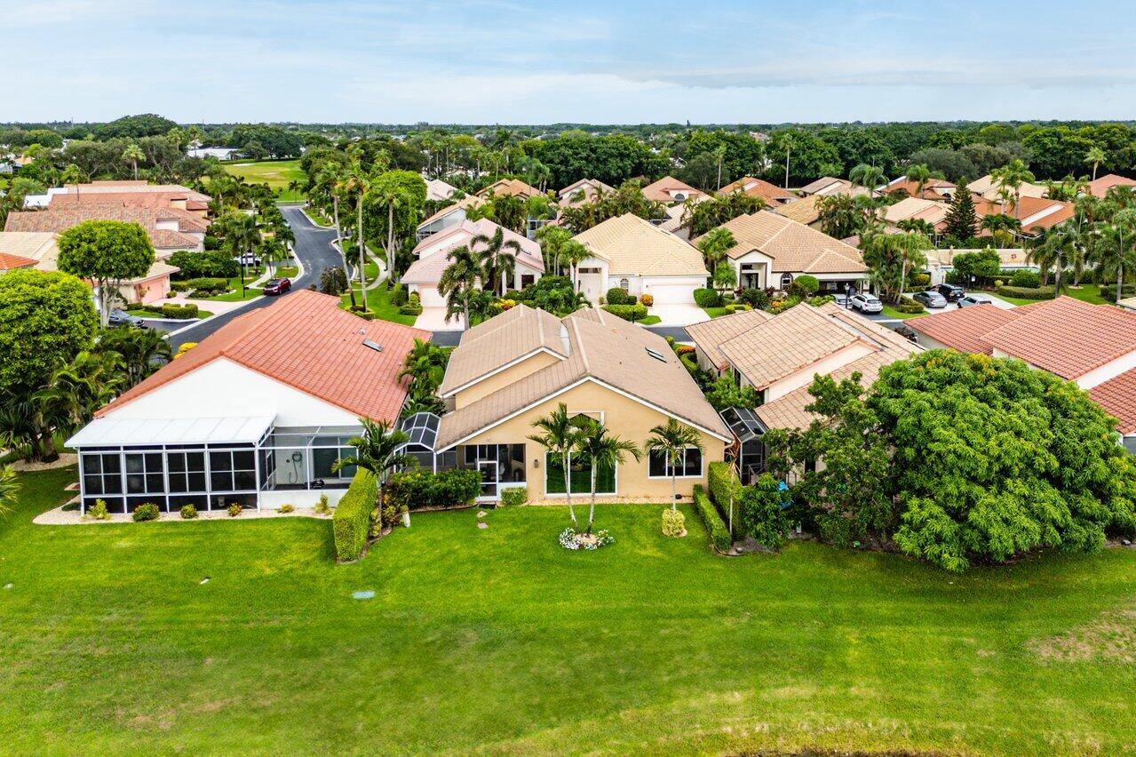 6052 Terra Mere Circle Boynton Beach, FL 33437 - Photo 45 of 52 a aerial view of a house with a big yard