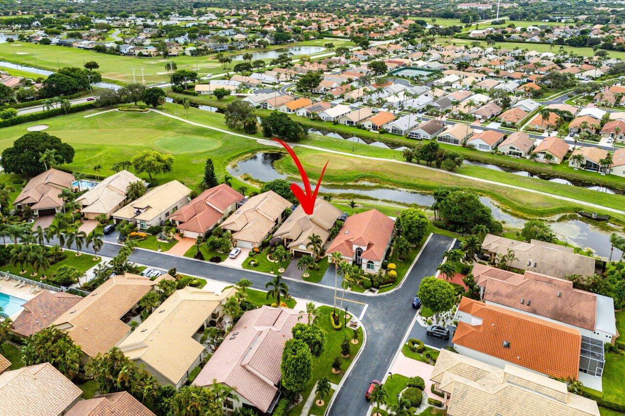 6052 Terra Mere Circle Boynton Beach, FL 33437 - Photo 47 of 52 an aerial view of a houses with outdoor space and street view