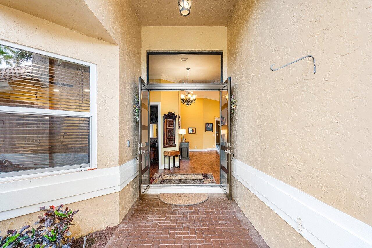 6052 Terra Mere Circle Boynton Beach, FL 33437 - Photo 5 of 52 a bathroom with a tub and shower