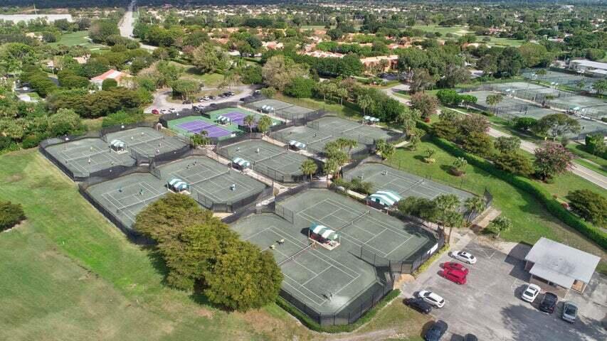 6052 Terra Mere Circle Boynton Beach, FL 33437 - Photo 52 of 52 an aerial view of residential houses with outdoor space