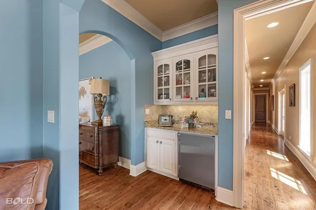 a view of a hardwood floor and workspace