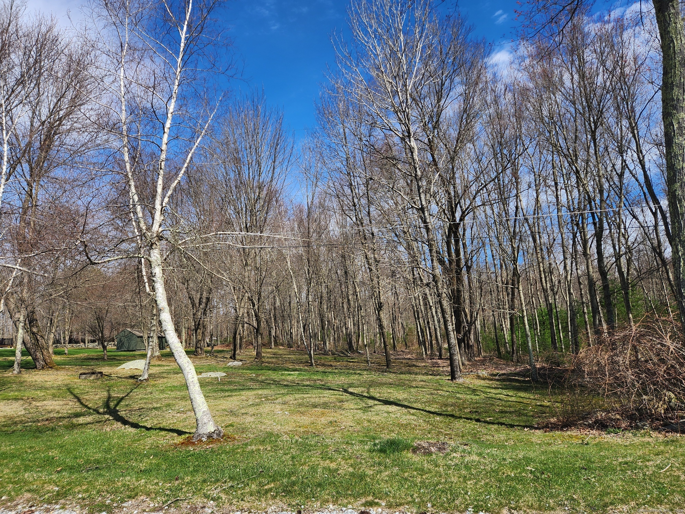 a view of a backyard with swings