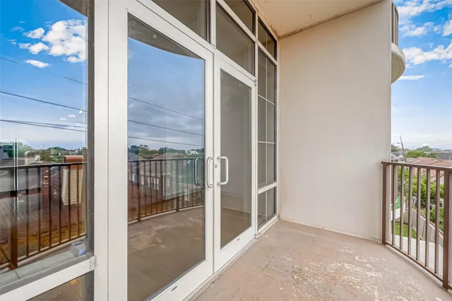 a view of a building with a swimming pool