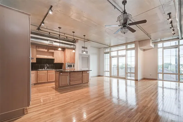 a view of a livingroom with wooden floor
