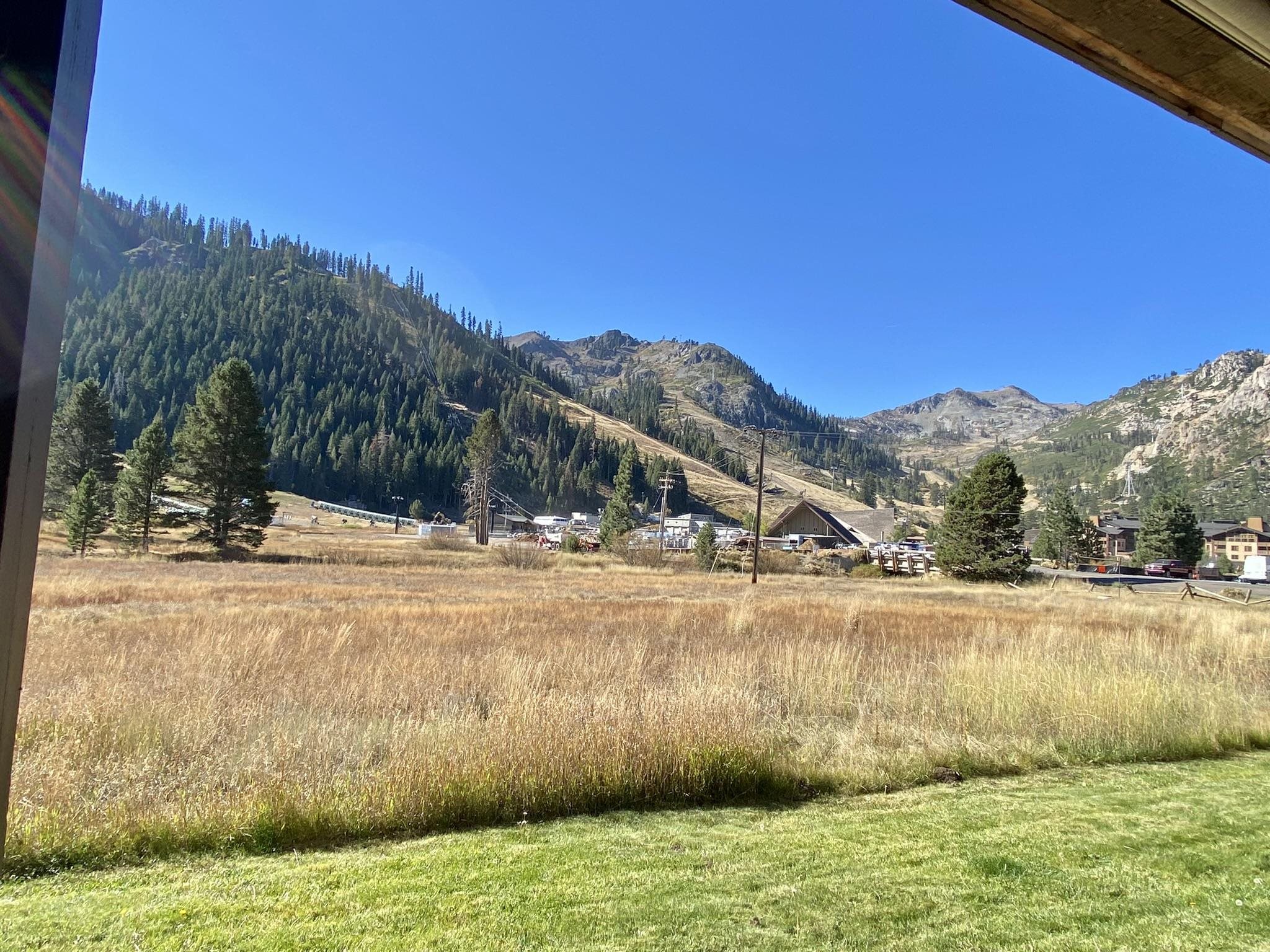 1591 Olympic Vly Road, Unit 28 Olympic Valley, CA 96146 - Photo 3 of 18 a view of a yard with an ocean