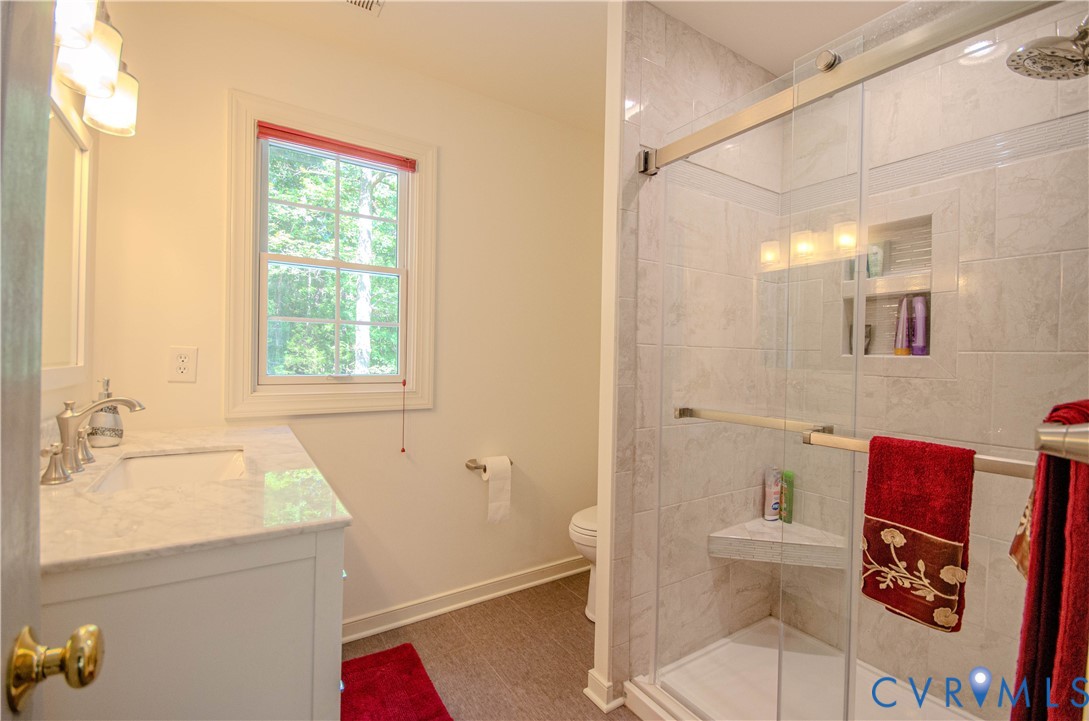 12500 Musical Lane Midlothian, VA 23113 - Photo 23 of 51 Bathroom featuring a vanity with an integrated sin