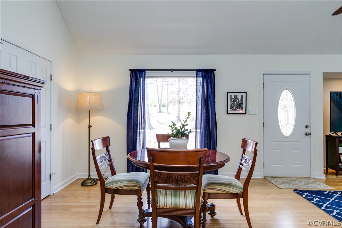 13835 Happy Hill Road Chester, VA 23831 - Photo 12 of 35 a view of a dining room with furniture and a window