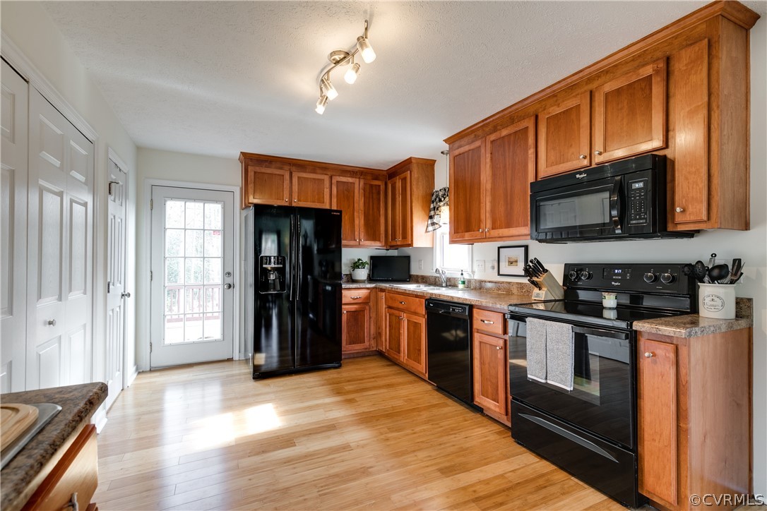 13835 Happy Hill Road Chester, VA 23831 - Photo 13 of 35 a kitchen with stainless steel appliances granite countertop a refrigerator stove top oven a sink and dishwasher