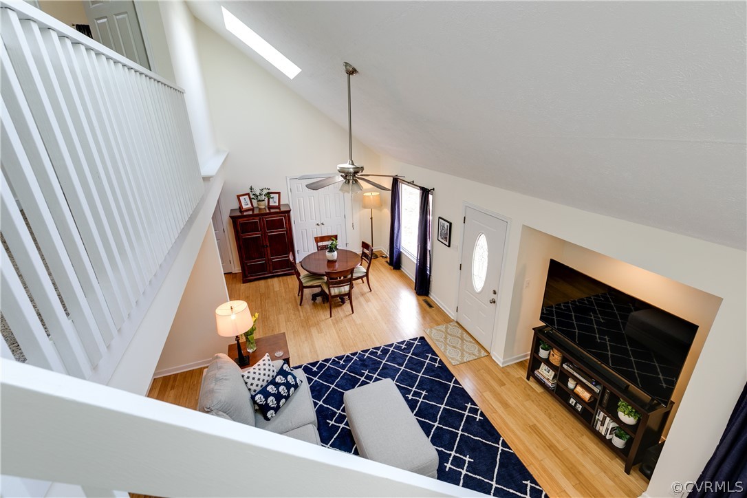 13835 Happy Hill Road Chester, VA 23831 - Photo 21 of 35 a living room with furniture and a flat screen tv
