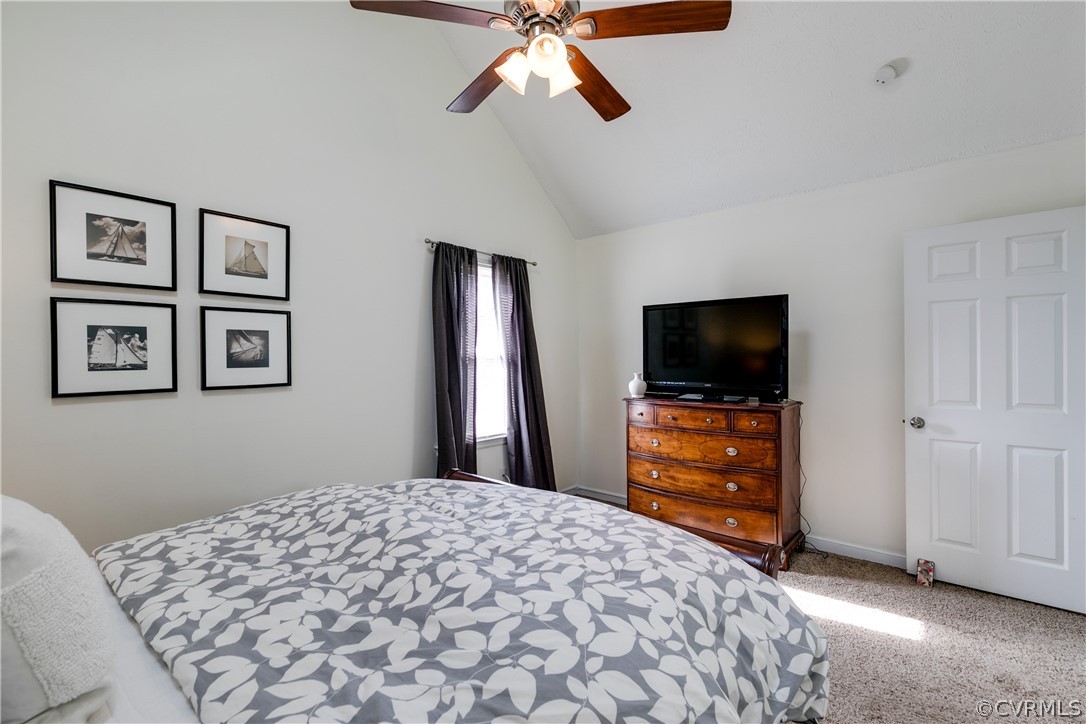 13835 Happy Hill Road Chester, VA 23831 - Photo 26 of 35 a bedroom with a bed and a flat screen tv