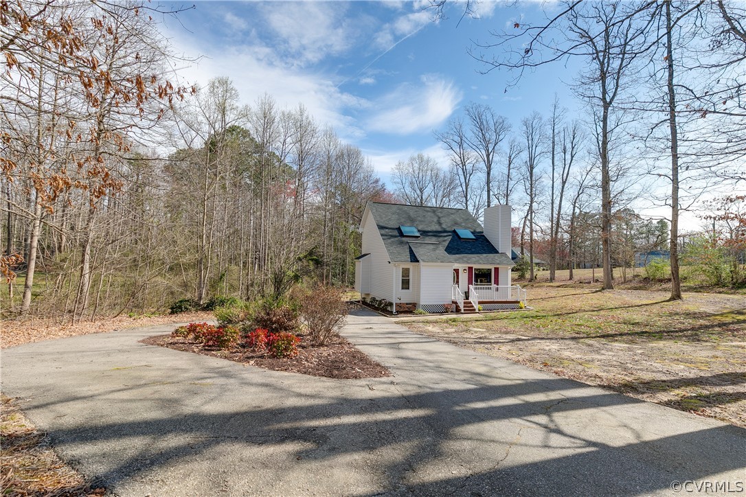 13835 Happy Hill Road Chester, VA 23831 - Photo 3 of 35 a view of a town with large trees