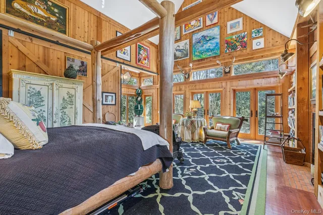 a bathroom with a granite countertop shower a toilet and a sink