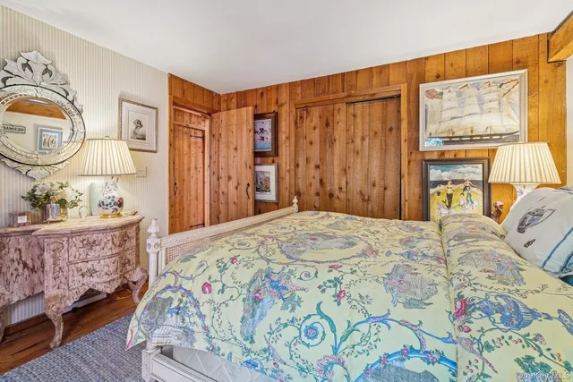 a living room with furniture a large window