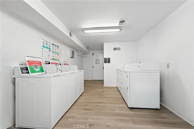 a utility room with washer and dryer