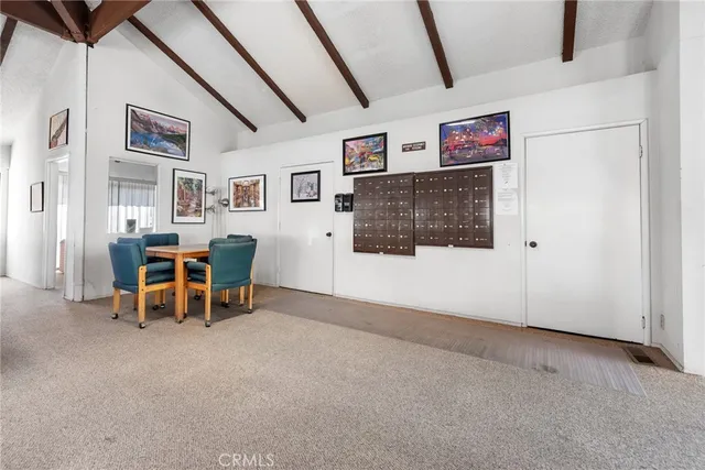 a view of a livingroom with furniture and furniture