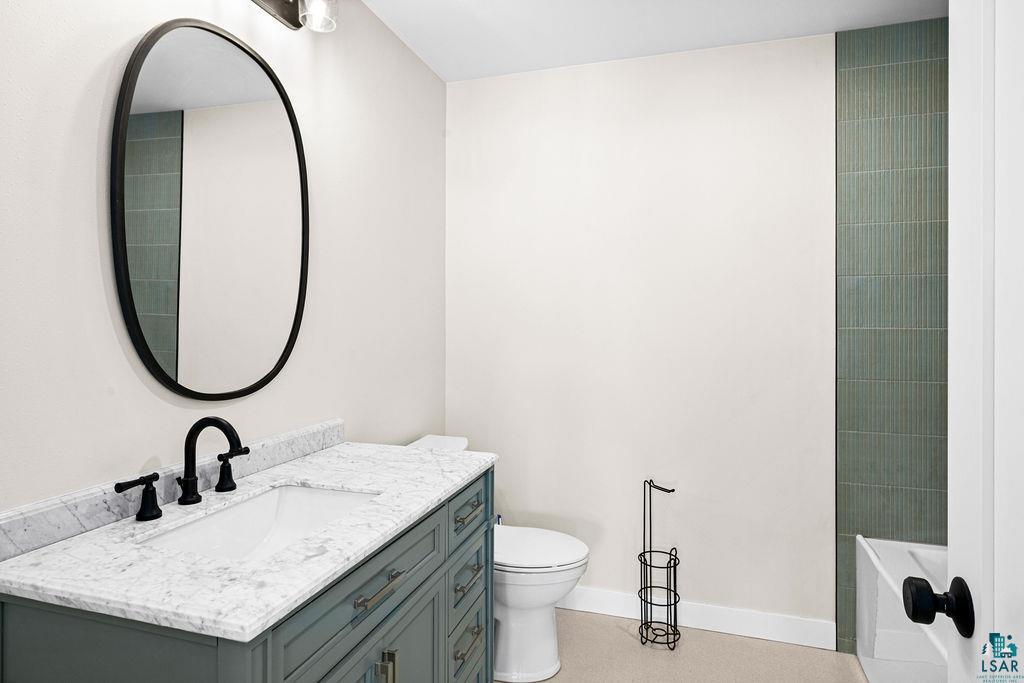 2236 Hoover Street Duluth, MN 55811 - Photo 32 of 52 Bathroom with vanity and a tub