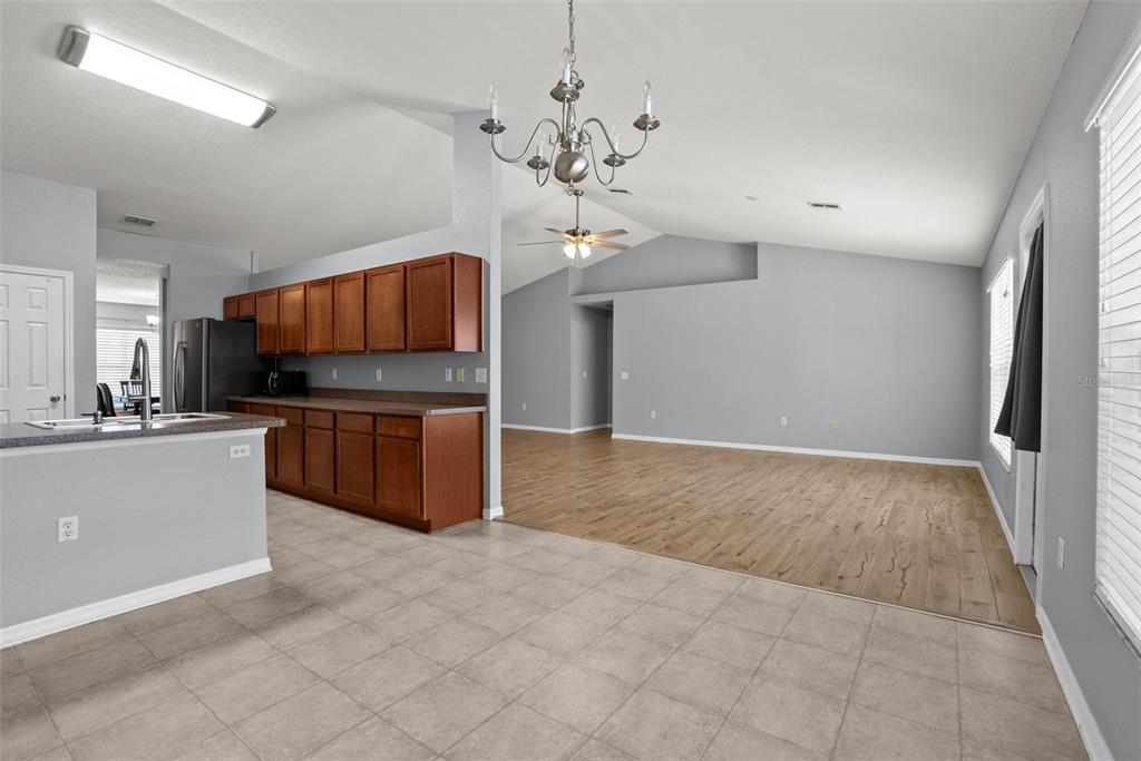 11366 Riddle Drive Spring Hill, FL 34609 - Photo 12 of 49 a view of kitchen with sink microwave and refrigerator